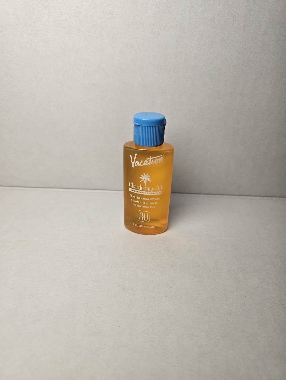 Chardonnay Oil SPF 30 Sunscreen - Blue Cap, Orange Bottle 1 FL OZ Travel Size - Picture 4 of 5
